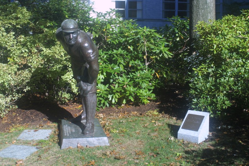 A statue of Cy Young getting ready to throw a pitch.